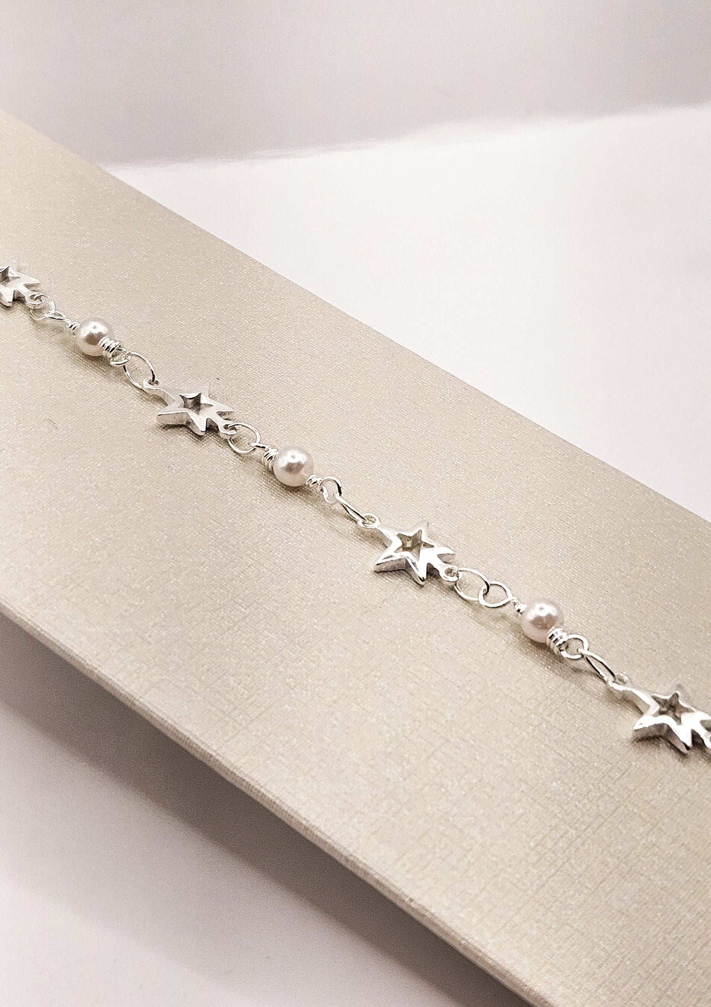 Pulseira Estrela de Pérola Prata