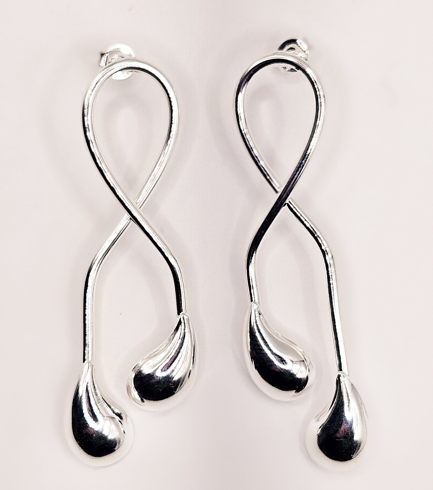 Brinco Elegância Fluida Prata